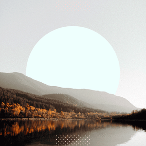 A picture of the sun rising or setting behind a mountain on a lake.